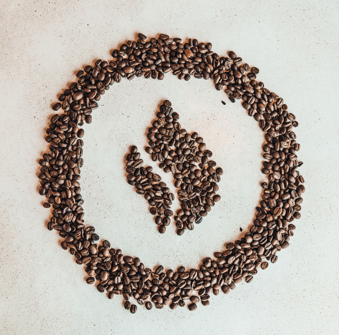 OpenFlame flame mark formed with coffee beans